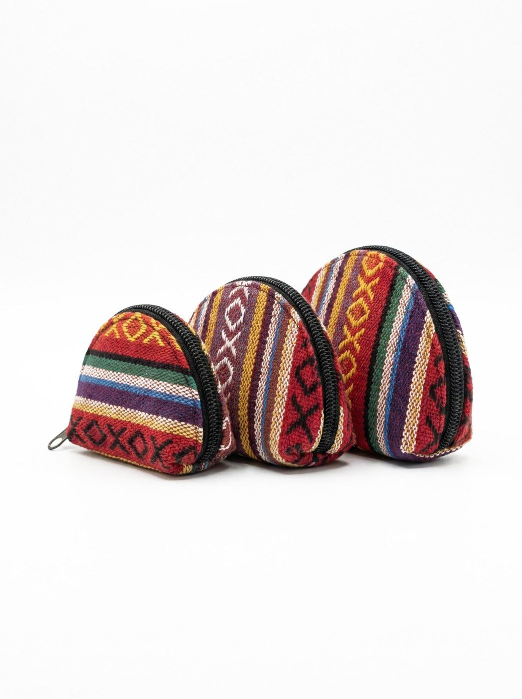 Three half-moon coin purses in a row