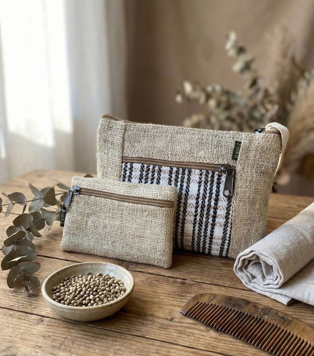 Hemp coin purse and zipper pouch on a wooden table