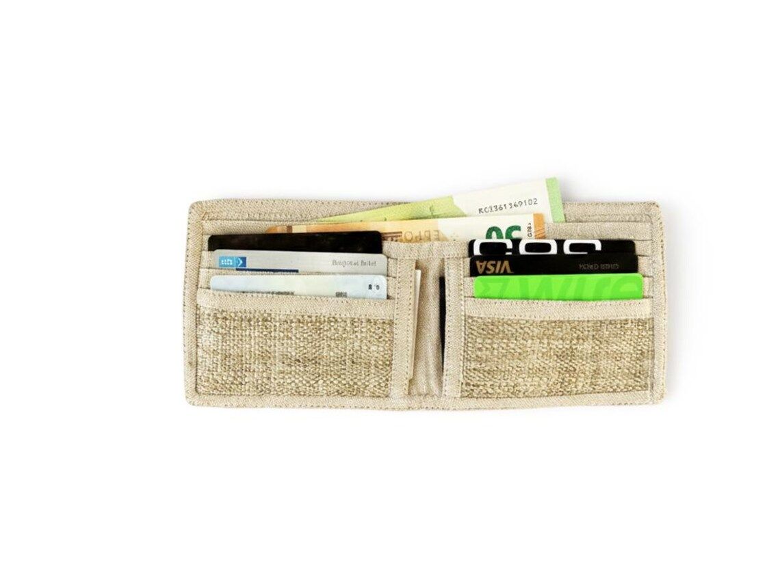 Natural hemp bifold wallet open showing the weave of the hemp fabric